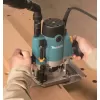 Vrchní frézka s regulací 1100W, Makpac Makita RP1111CJ